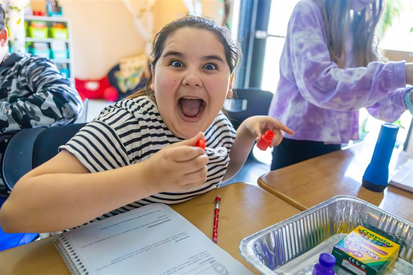 Elementary students doing a light lab